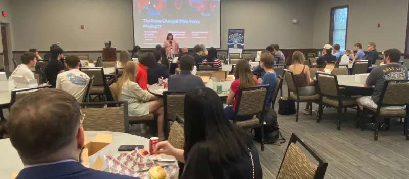 Amy D. Love presenting to families and educators